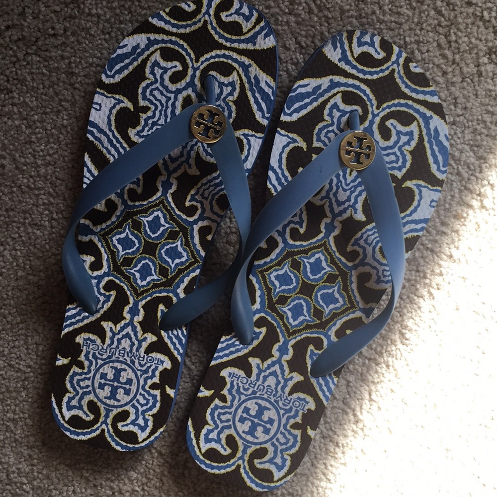 Tory Burch flip flops with gold logo